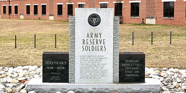 Large engraved stone outside of military building that reads Army Reserve Soldiers