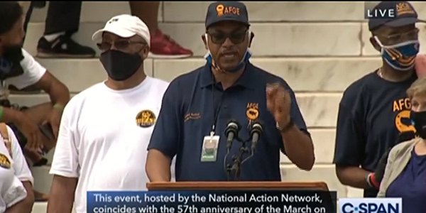 AFGE President Kelley at podium speaking at the 57th anniversary March on Washington