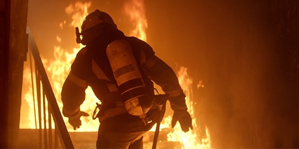 Firefighter heading toward a fire