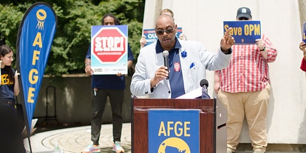 Everett Kelley addressing crowd at an OPM rally