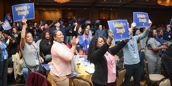 AFGE members holding up signs during Legislative Conference