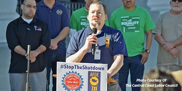 Erich Schmidt speaking at rally