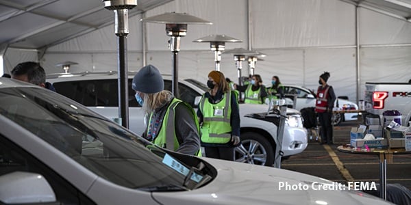 FEMA workers working a covid drive thru