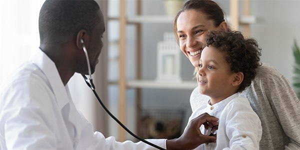 Woman with child seeing a doctor 