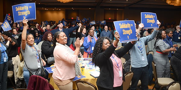 AFGE members holding signs at Legislative Conference