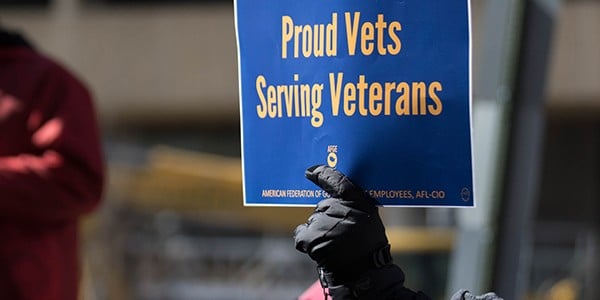 Sign that reads Proud Vets Serving Veterans