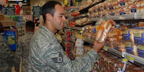 Military person shopping in grocery story