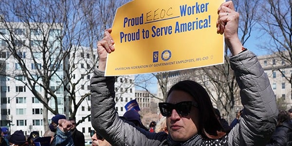 AFGE activist holding rally sign