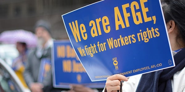 Activist with rally sign