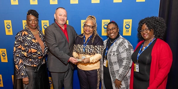 AFGE member receiving an award