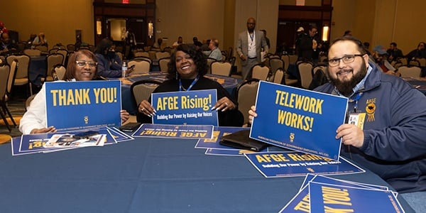 Members with telework signs