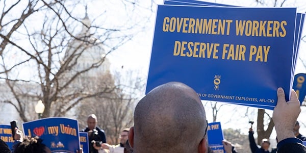 Government workers deserve fair pay rally sign