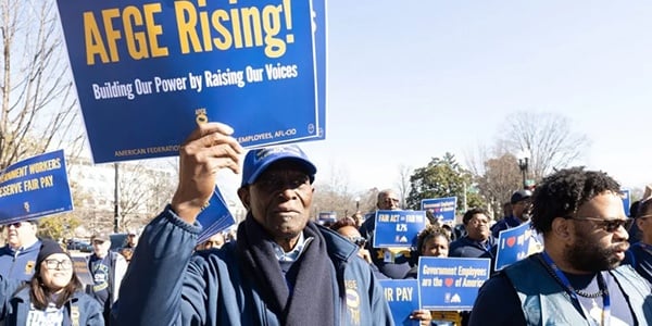 AFGE member marching at a rally