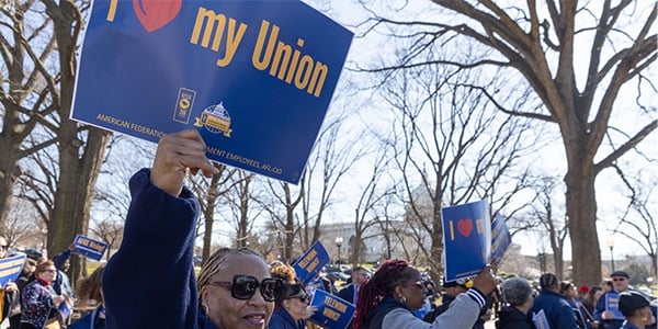 AFGE member holding rally sign