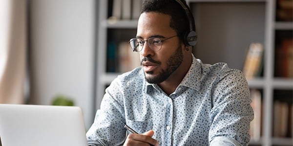 Man sitting at a computer