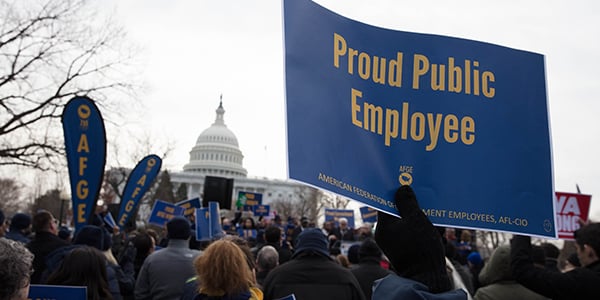 AFGE activist holding rally sign