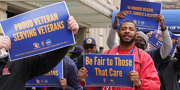 AFGE activists with rally sign