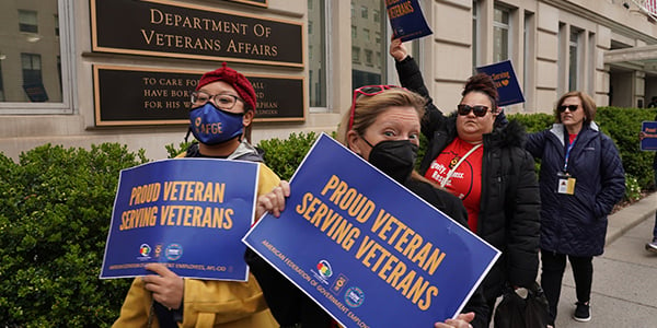 AFGE activists with rally sign