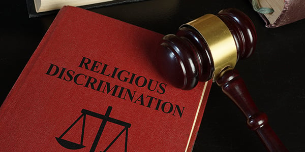 Stock photo of book with cover that reads religious discrimination