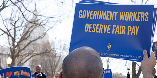 AFGE member holding rally sign