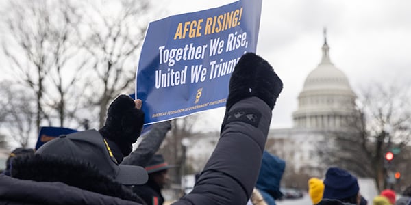 AFGE activist holding rally sign