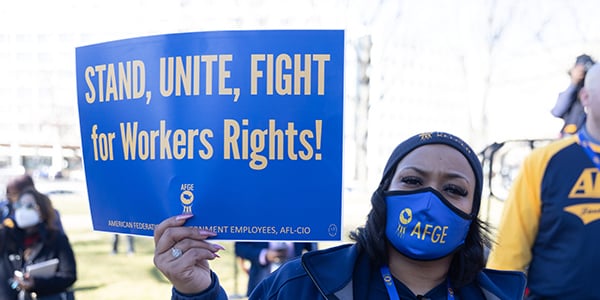 AFGE activist holding rally sign