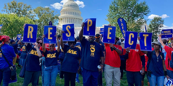 AFGE activists with rally signs