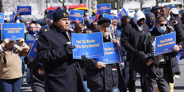 AFGE activists holding rally signs